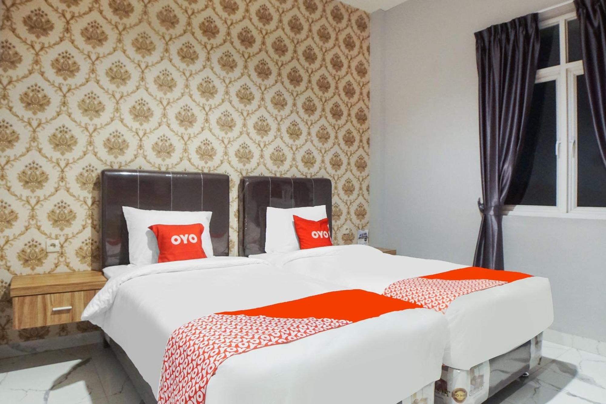 Super Oyo Capital O 92066 Papakoel Hotel & Cafe Medan Eksteriør billede